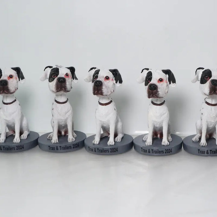 Five identical dog bobblehead